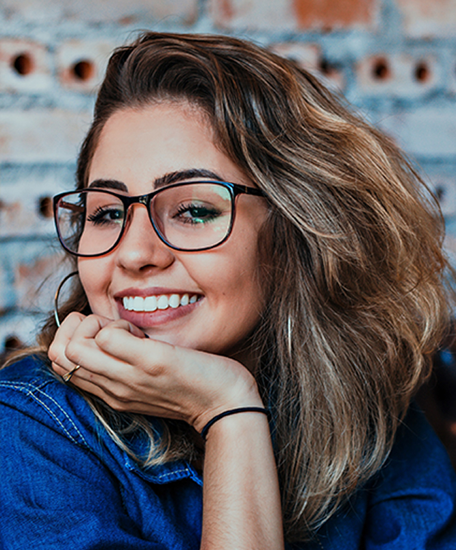 Smiling Woman Wearing Glasses
