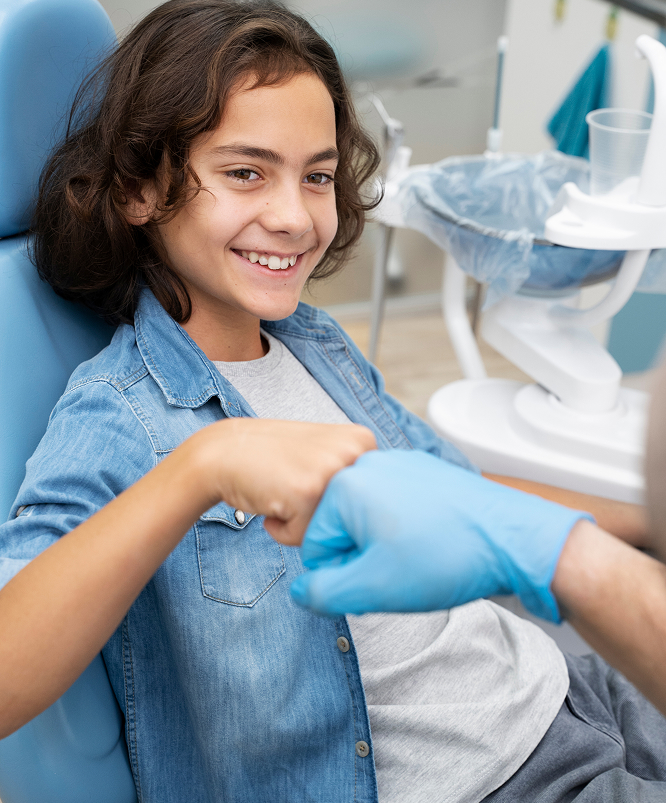 Doctor Fist Bumping With A Child Patient