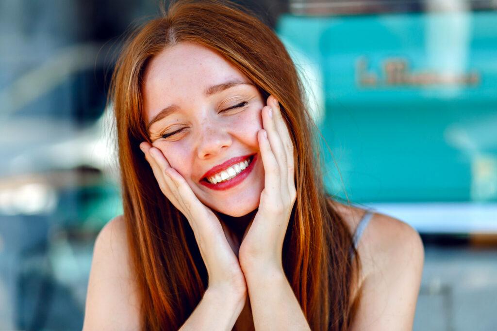 Close Up Portrait Or Pretty Cute Redhead Woman Smiling And Having Fun
