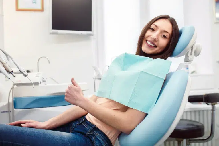 Positive Girl in Dentist Chair